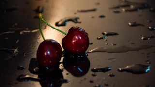 Cherry shiny surface water drops - 8k artistic photography free wallpaper
