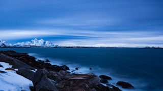 Rocky shore snow mountains night - a rocky shore free wallpaper