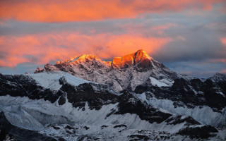 Mountain range sunset clouds snow - a few snow free wallpaper