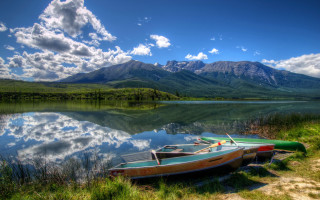 Lake mountains shore boat clouds - the shore of a lake free wallpaper