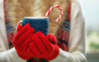 Person holding cup candycane red - a candy cane free wallpaper