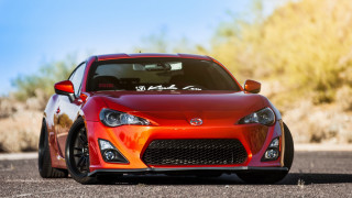 Red sports car desert road 5 - a few bush free wallpaper