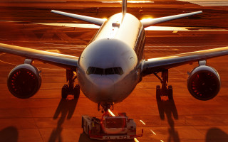 Jetliner sunset tarmac backlit international - top of an airport tarmac free wallpaper