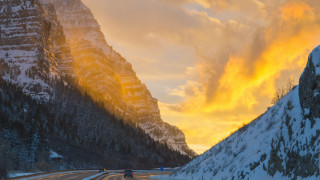 Mountain road sunset car forest - a yellow sky free wallpaper
