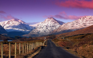 Sunset mountains fence road cityscape - a pink sky free wallpaper