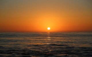 Sunset ocean boat surfboard moon - the water and a person free wallpaper