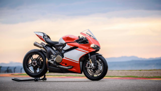 Red white motorcycle mountain road - a cloudy sky free wallpaper