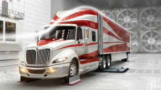 Semi truck parked white wall - a semi truck free wallpaper