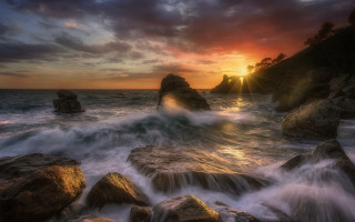 Sunset ocean rocks water formation - rock and water free wallpaper
