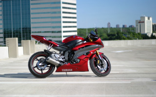 Red motorcycle city building sky - a red motorcycle free wallpaper