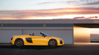 Yellow sports car garage sunset - a yellow sports car free wallpaper
