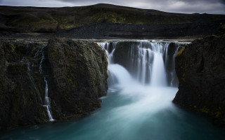Waterfall mountain bodywater rock sky - a body of water below free wallpaper