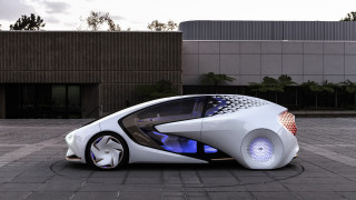 Futuristic car parking lot blue - a building in the background free wallpaper