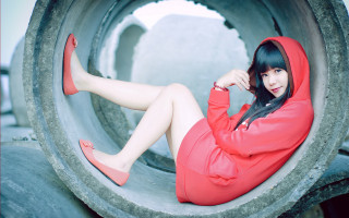 Woman red hoodie sitting pipe - a red hoodie free wallpaper