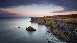 Lake cliff water clouds beach - a grassy area free wallpaper