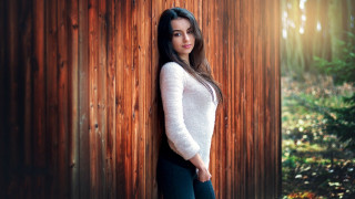 Woman leaning wooden wall forest - leaning free wallpaper