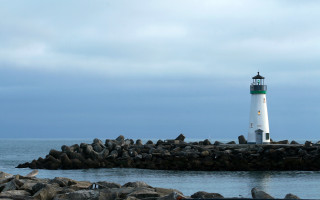 Lighthouse rocky pier precisionism cloudy - rocky free wallpaper
