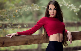 Woman red top fence model - a fence free wallpaper