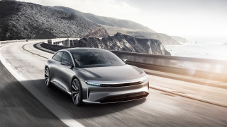 Silver car ocean mountains sunlit - a silver car free wallpaper