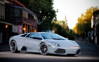 White sports car road building 2 - the side of the road in front free wallpaper