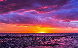 Sunset ocean boat cloudy sky 2 - colorful cloud free wallpaper