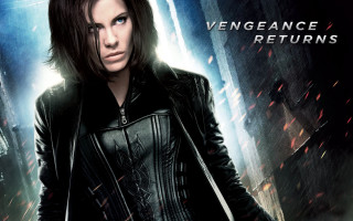 Woman leather gun movie poster - a leather outfit holding free wallpaper