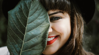 Woman hat leaf smiling naturalism - facial feature free wallpaper