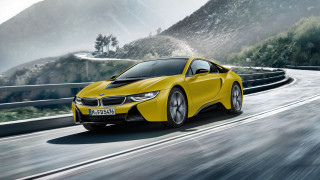 Yellow car mountain road digital - a mountain range in the background free wallpaper