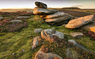 Rock formation grassy field sunset 3 - a grassy field free wallpaper