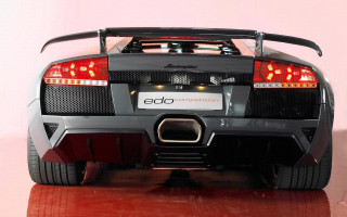 Black sports car red tail 2 - a red tail light free wallpaper