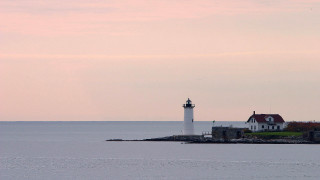 Lighthouse island ocean boat scenery - the water below free wallpaper