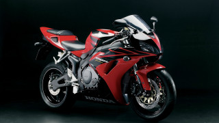 Red motorcycle dark room photorealism - a red motorcycle free wallpaper