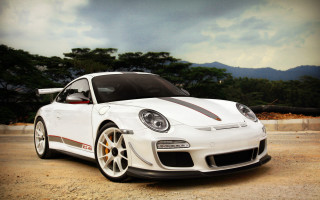 White sports car parking lot 18 - a cloudy sky above free wallpaper