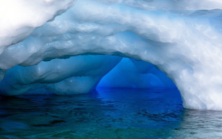 Iceberg blue water cave ocean - a large iceberg free wallpaper