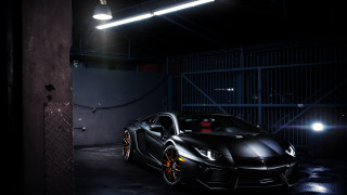 Black sports car garage night - andrew law free wallpaper