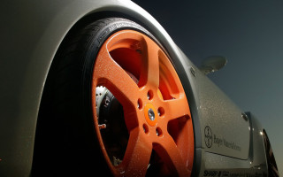 Car tire starry sky ultrafine - a close up of a car tire free wallpaper