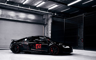 Black sports car red number - door free wallpaper