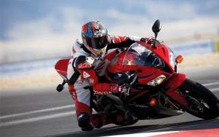 Motorcycle rider helmet track outdoors - redshift free wallpaper