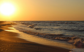 Beach waves sunset person sand - the distance behind free wallpaper