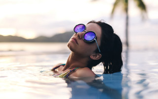 Summer vibrant pool beach sunglasses - a palm tree in the background free wallpaper