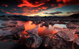 Sunset water rocks clouds mystical 3 - the foreground and a sky free wallpaper