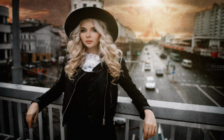 Blonde woman gothic cityscape balcony - a balcony free wallpaper