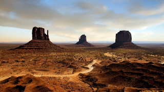 Desert landscape river rocks cloudy - two large rock free wallpaper