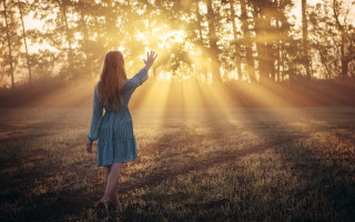 Woman blue dress outstretched arms - radiant free wallpaper