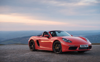 Red sports car mountains sunset 4 - a sunset in the background free wallpaper