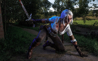 Woman cosplay sword forest night - a picture in a field free wallpaper