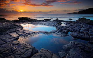 Sunset rocky beach pool mountain - a sunset over a rocky beach free wallpaper