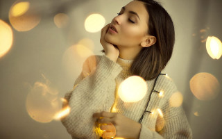 Woman candle holding looking sky - a candle free wallpaper