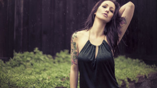 Gothic tattooed woman rain forest - her arm behind her head free wallpaper