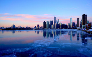 City skyline reflection lake winter - ice flo free wallpaper